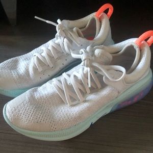 Nike Joy Ride running shoes. 1/2 size up.